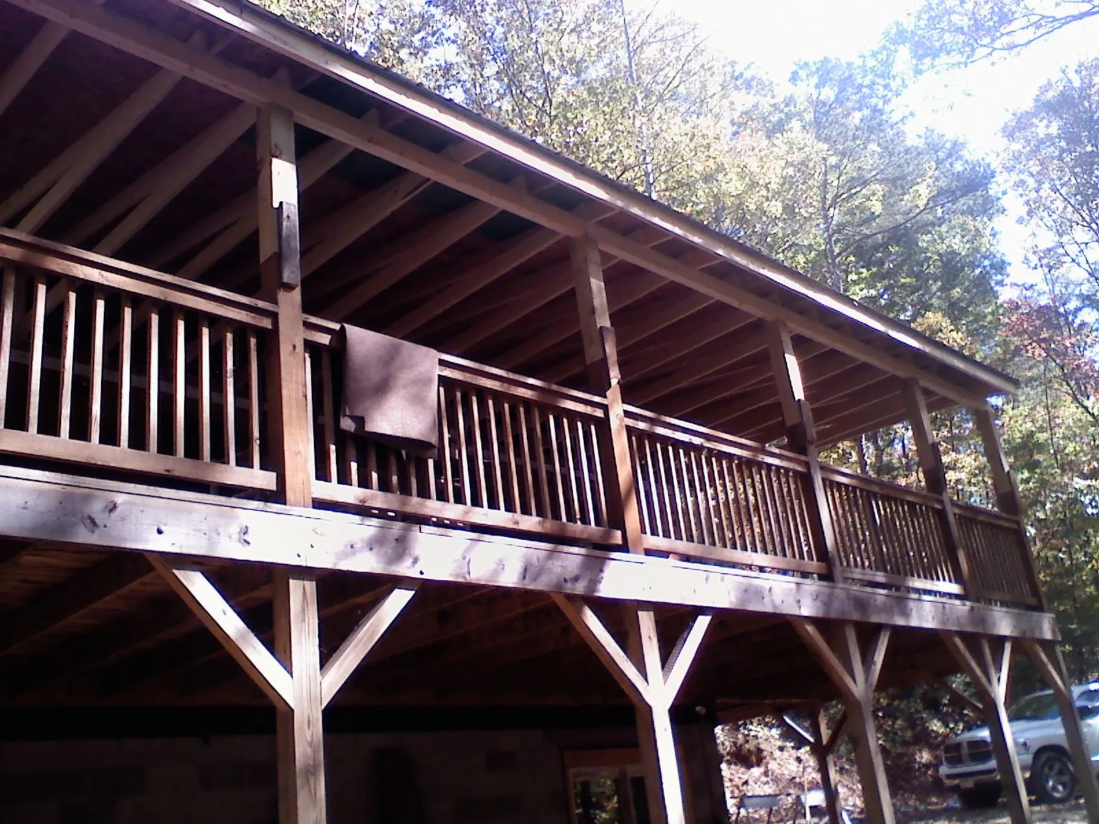 Timber framing under a new elevated porch and deck — Roof Leak Repair in Takoma Park by Roofing Brothers